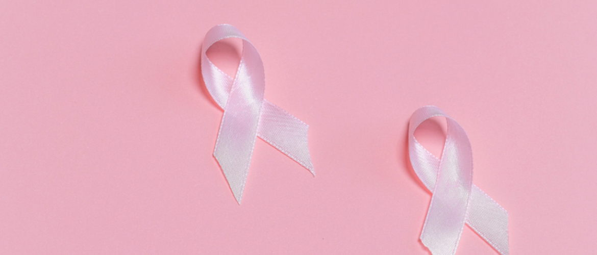Two pink ribbons positioned in the centre-right region of the image.